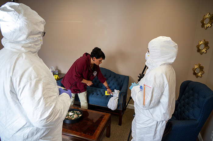 Federal Law Enforcement Senior Instructor Anna “Jo-Jo” Castillo guiding students through a crime scene investigation.