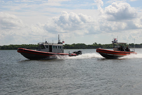 The Non-Compliant Vessel Pursuit Schoolhouse providing advanced pursuit operations training to Coast Guard Coxswains and Crewman during an exercise on the Wando River in Charleston, South Carolina.