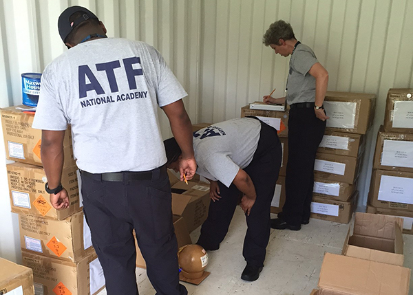 students use inert training materials to learn how explosives are safely stored. (FLETC Stock Images)