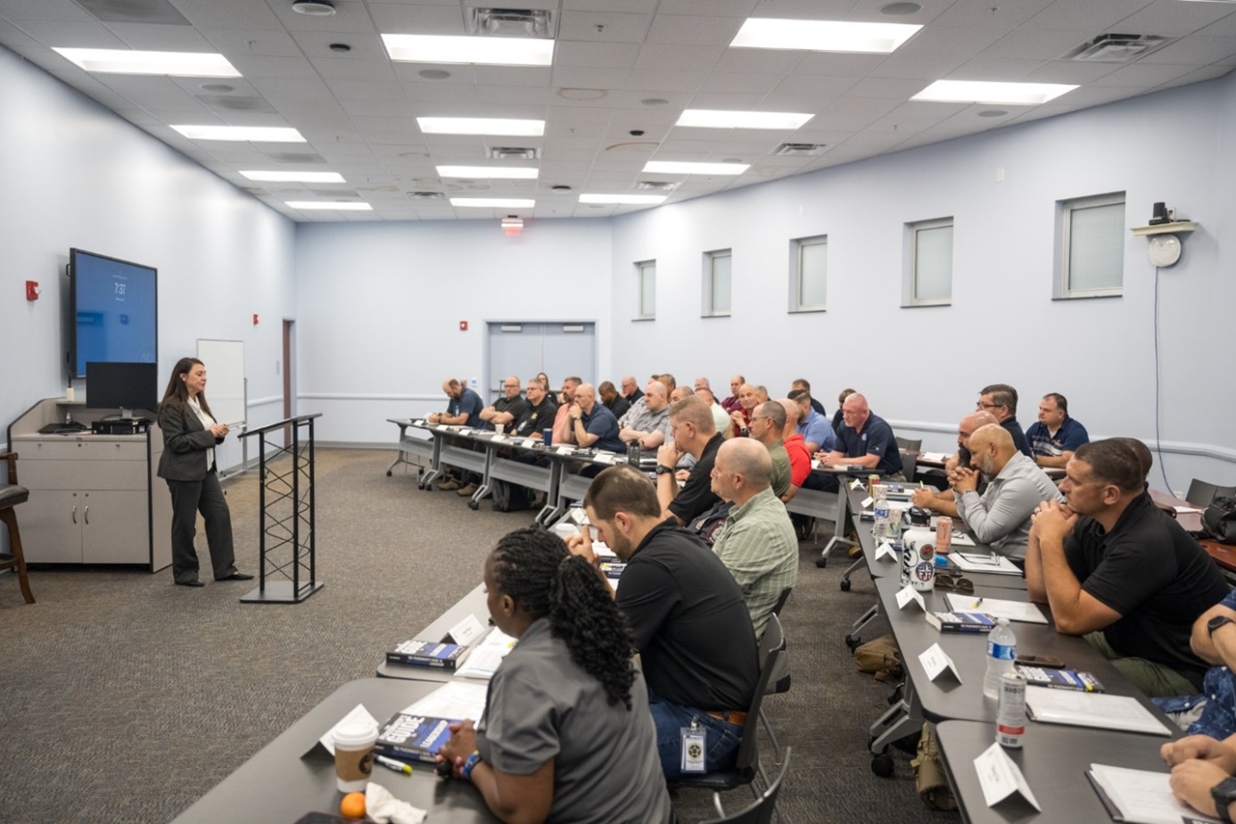 Federal Law Enforcement Training Centers, Acting Deputy Director Ariana Roddini, delivers opening remarks and welcomes the 22nd class of the Department of Homeland Security Leadership Academy, where this nationally recognized program brought together senior law enforcement executives and command-level staff from across the country and world for an intensive two-week curriculum focused on crisis leadership, strategic thinking, and resilience from May 12 – 22, 2025, Glynco Ga. (FLETC OPA/Mindy Vu)