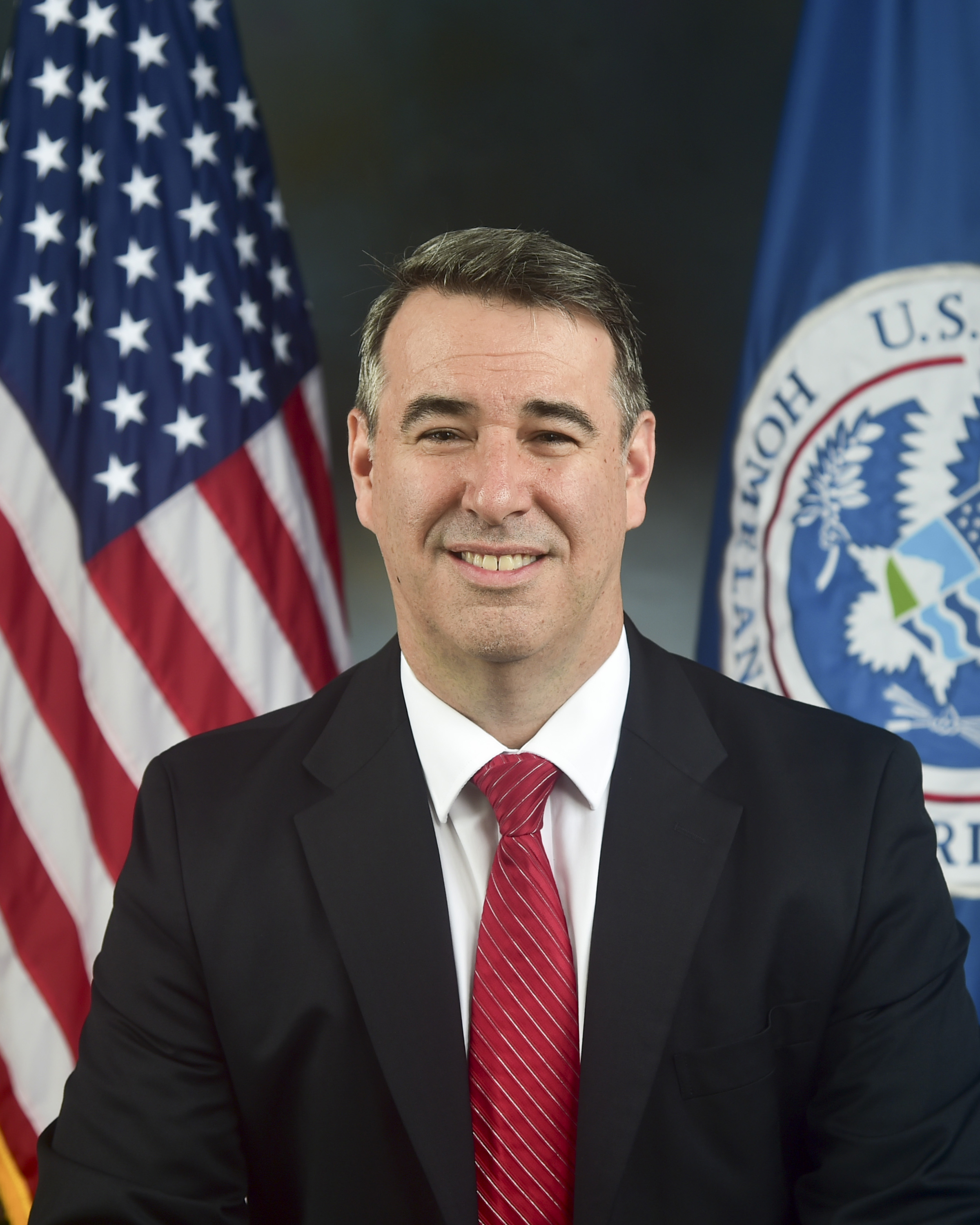 Deputy Director Paul E. Baker (Official Photo)