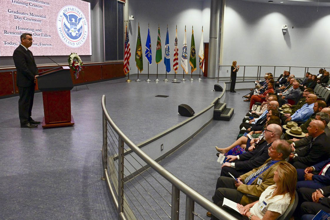 Acting FLETC Director Paul E. Baker delivers a powerful tribute during the Graduates Memorial Day Ceremony, honoring the courage and sacrifice of nine fallen graduates newly inscribed on the FLETC Graduates Memorial, Glynco, Ga., May 7, 2025. (FLETC OPA/David Tucker)
