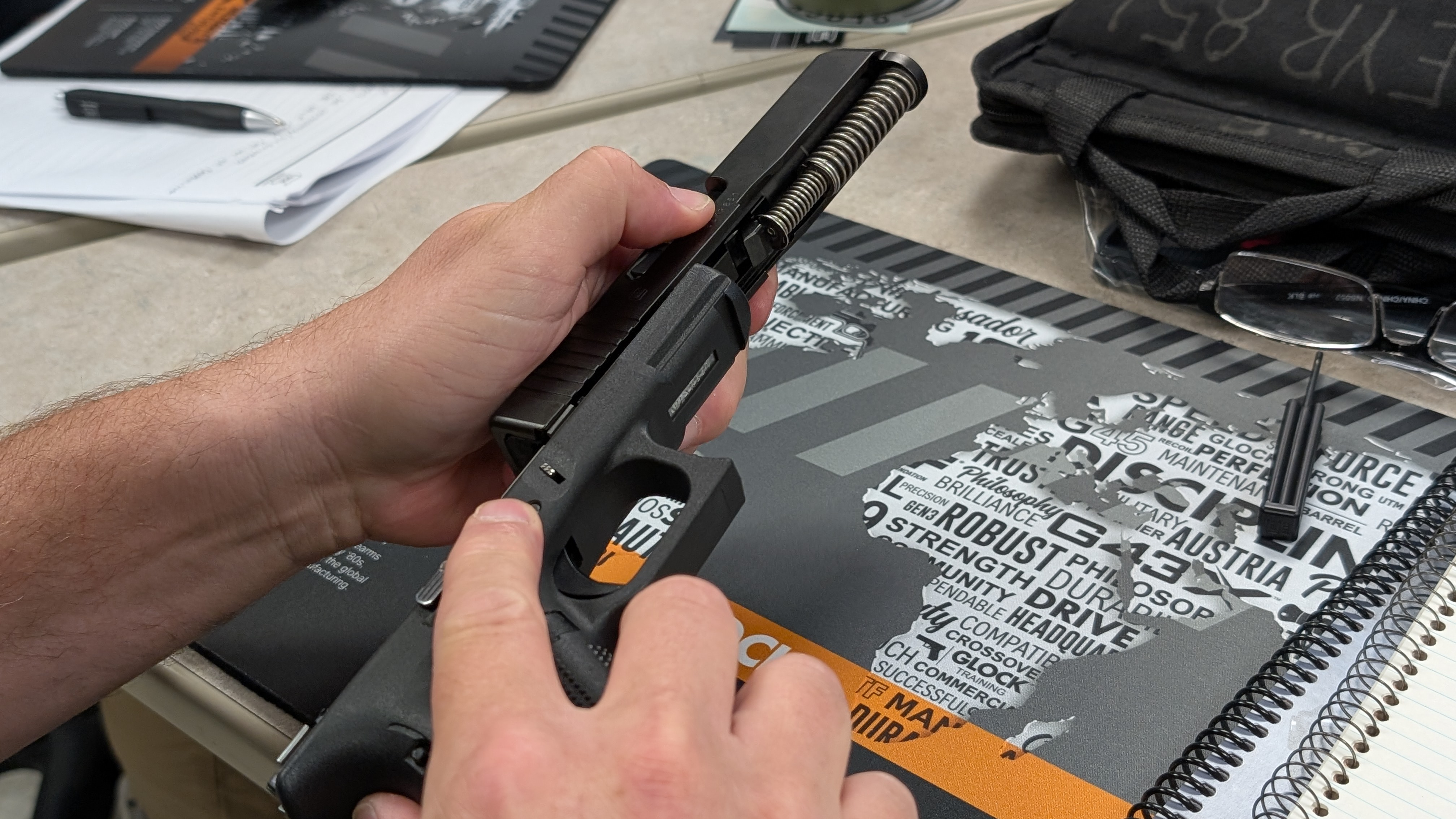 Federal Law Enforcement Training Centers students of the Glock Armorers course disassemble and reassemble Gen 5, semiautomatic pistols, aimed at familiarization and maintenance to maintain operational readiness and safety in the field Glynco, GA. May 20, 2025.