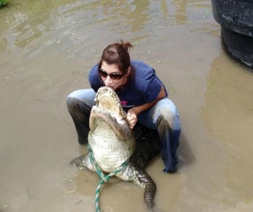 Sheila Ramos learning how to wrangle an alligator on a trip in Colorado. 