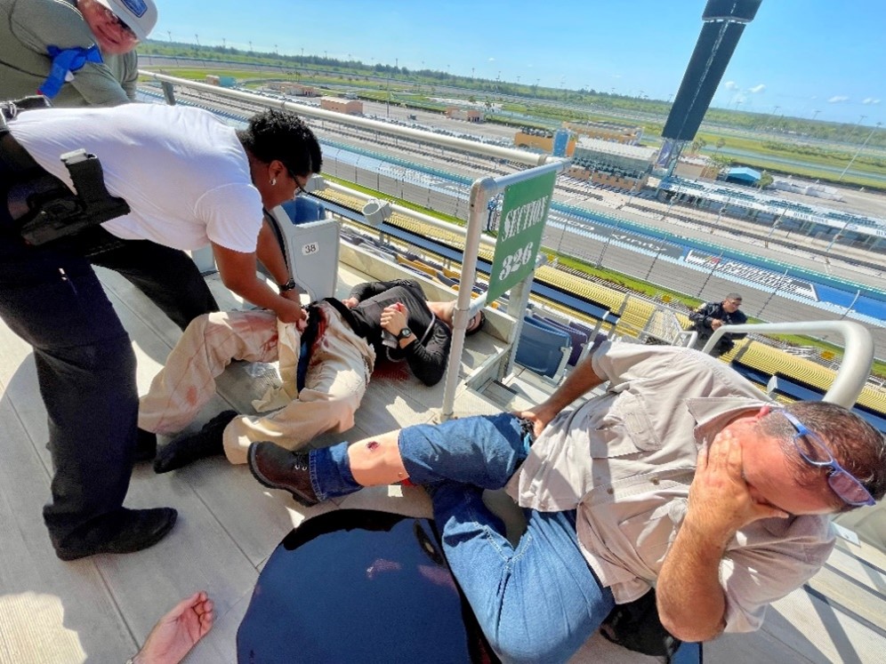 Miami area law enforcement perform live-saving tactical medical skills in an active shooter scenario at Homestead-Miami Speedway, May 18, 2022, in Homestead, Florida. (Photo by Christa Crawford Thompson/FLETC OPA)