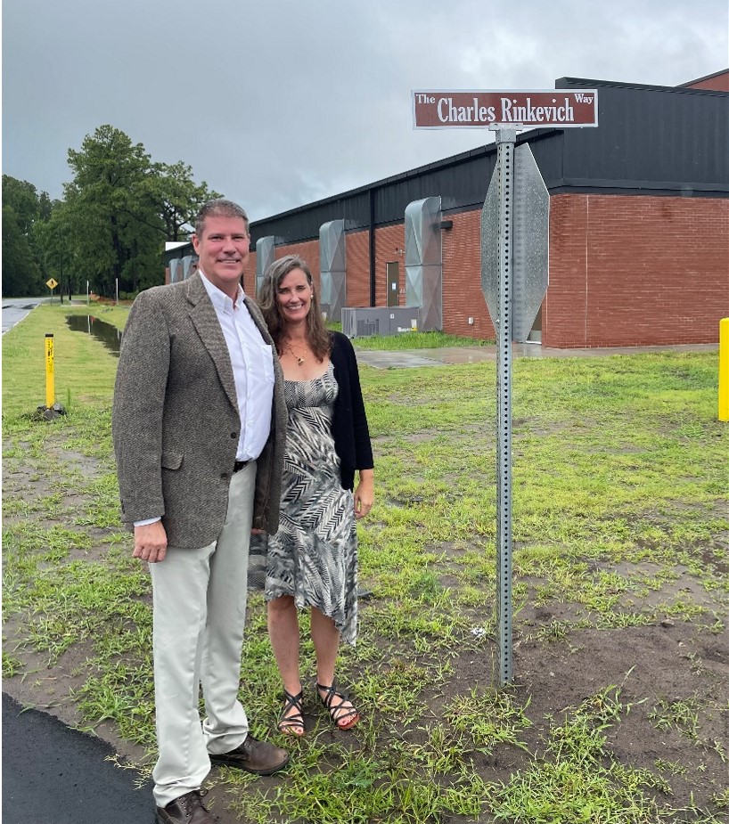 Former Director Charles F. Rinkevich’s son and daughter, Charles Rinkevich and Monica Rinkevich-Pathi, at the start of “The Charles Rinkevich Way,” the street named after their father in FLETC’s Realistic Training City named Danis City at FLETC-Glynco, GA, June 4, 2025. (Photo by Brian Jones/OPA)