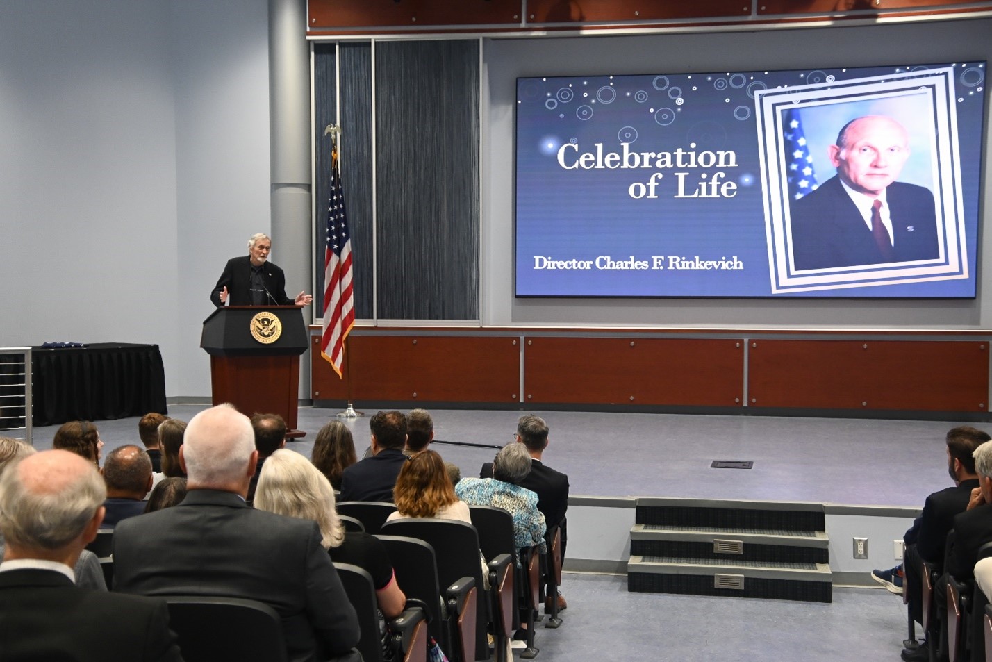 Former FLETC Senior Associate Director, John Dooher, delivered remarks at the Celebration of Life Ceremony for Former Director Charles F. Rinkevich, June 4, 2025, Glynco GA (Photo by David Tucker/OPA)