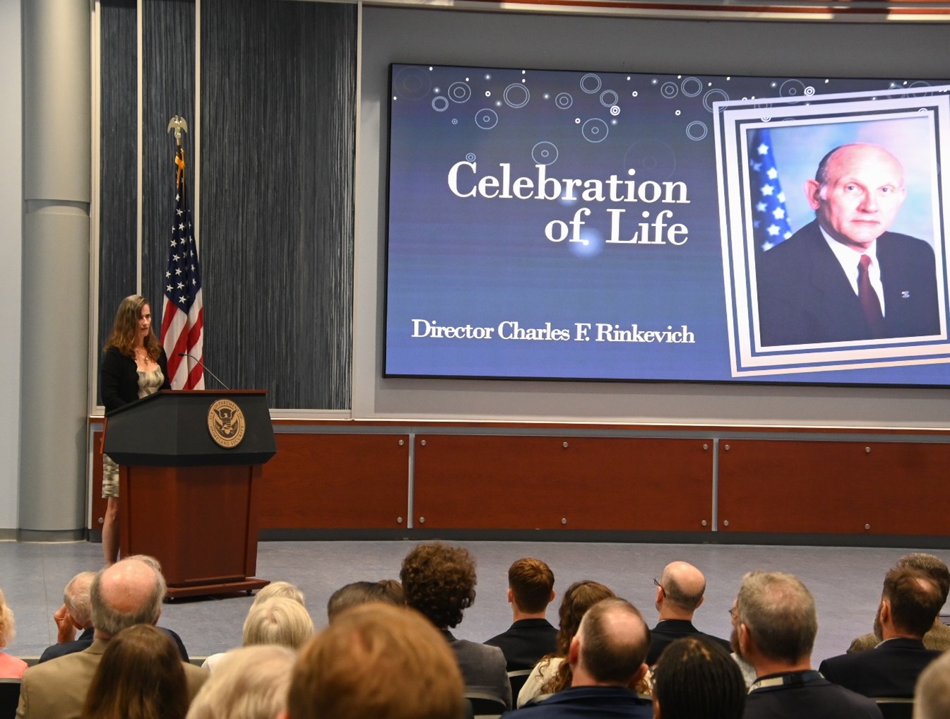 Monica Rinkevich-Pathi delivered remarks during her Father’s Celebration of Life Ceremony, June 4, 2025, Glynco GA (Photo by Diamond Sanders/OPA)