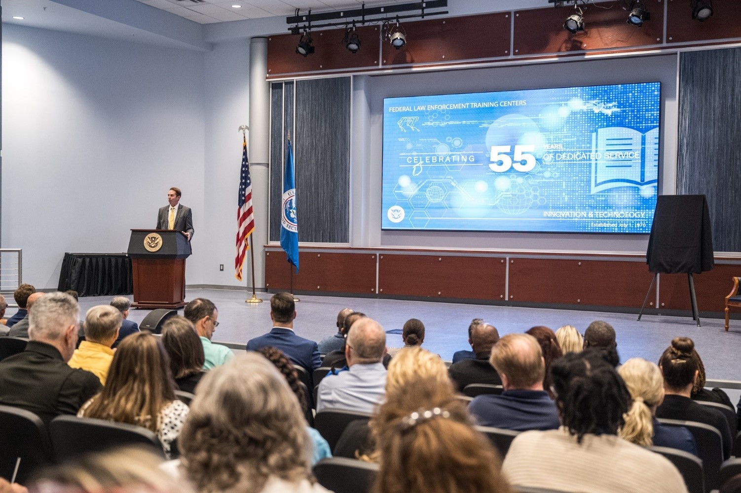 DHS Deputy Secretary Mr. Troy Edgar addresses the crowd during the FLETC 55th Anniversary Ceremony, July 1, 2025. Glynco, GA (photo by Mindy Vu, OPA)