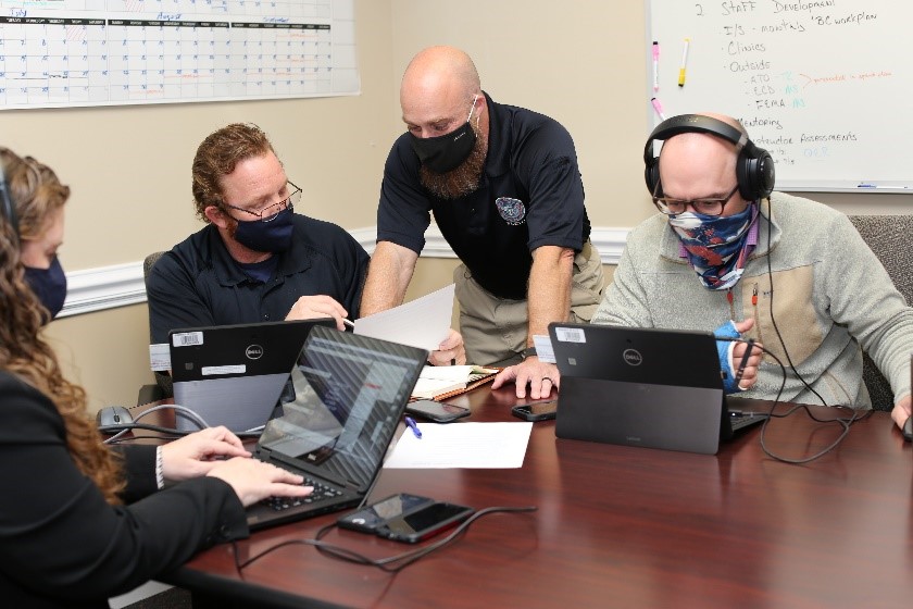 FLETC PTD and e-FLETC personnel prepare to kick-off day two and interact with participants of the Physical Techniques Division inaugural virtual training consortium:  The Truth Behind the Training.  State, local, tribal, and federal law enforcement agents and officers receive training on control tactics, fitness, force options, and officer resiliency.
