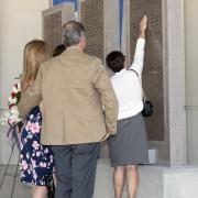 Family of fallen are comforted by seeing the names of their loved ones on the FLETC Graduates Memorial.  Photo by Keith Gartman, FLETC